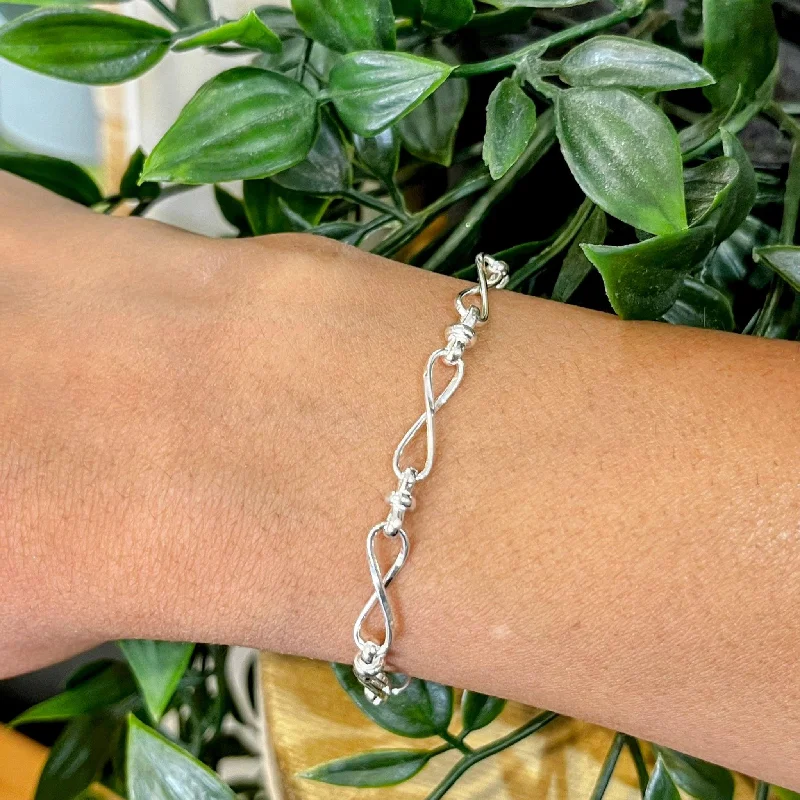 Sterling Silver Row of Infinity Twist Links Bracelet