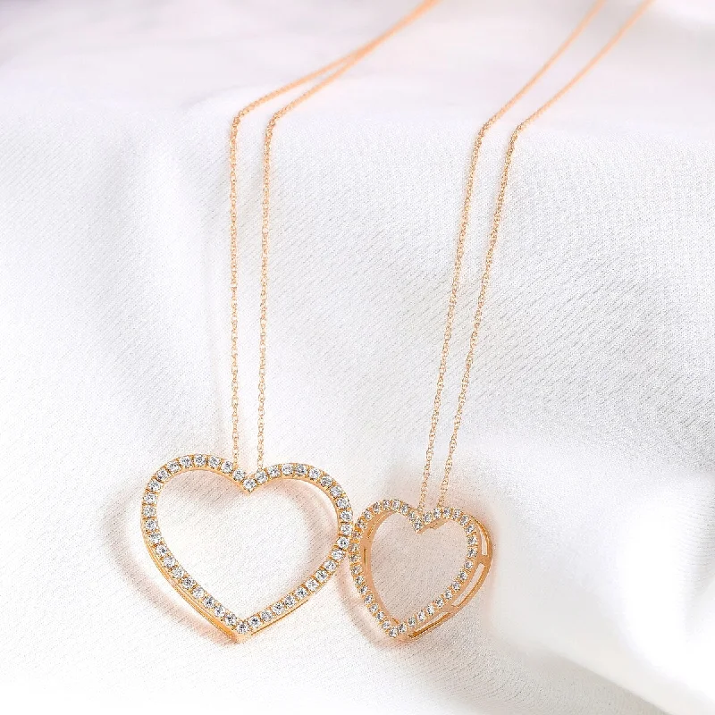 Worn bronze necklaces-1/6ct - 1/2ct TDW Diamond Open Heart Necklace in 14k Gold by De Couer