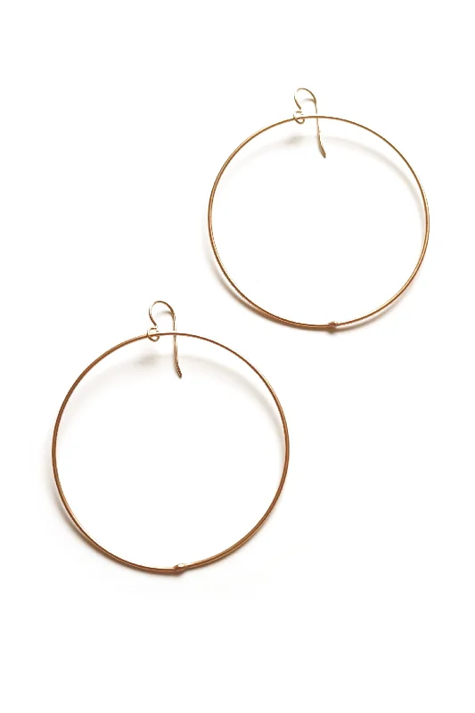 Astro motif earrings-extra large Evident earrings in bronze